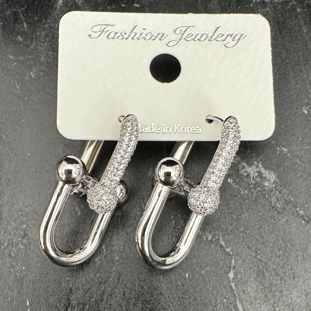 Sparkling Designer Inspired Silver color Earrings
